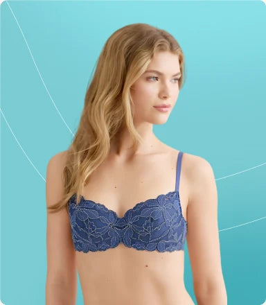 Model with a smaller bust wearing a lace balconette bra